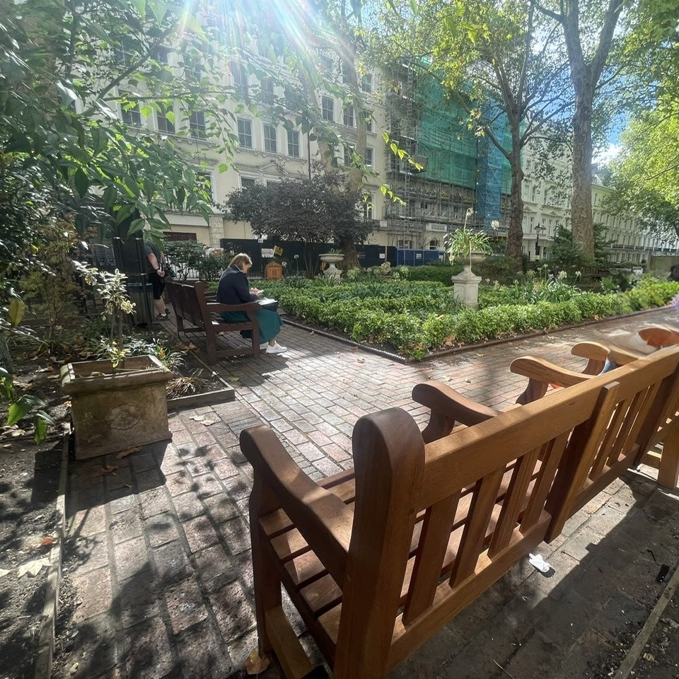 Gregory G. Caiazzo's memorial bench overlooking Norfolk Square Gardens in Paddington, London